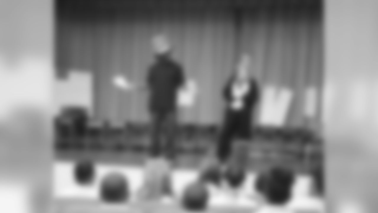 Omar Gaither reads with help from the Cat in the Hat