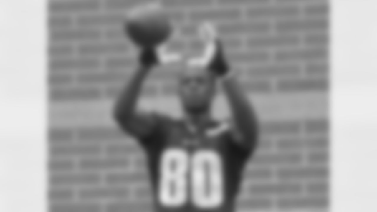 WR Ifeanyi Momah hauls in a pass after practice