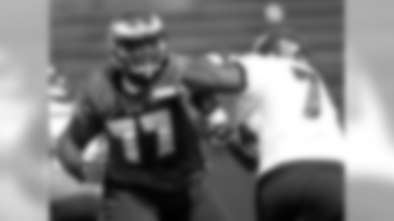 T Demetress Bell and DE Vinny Curry