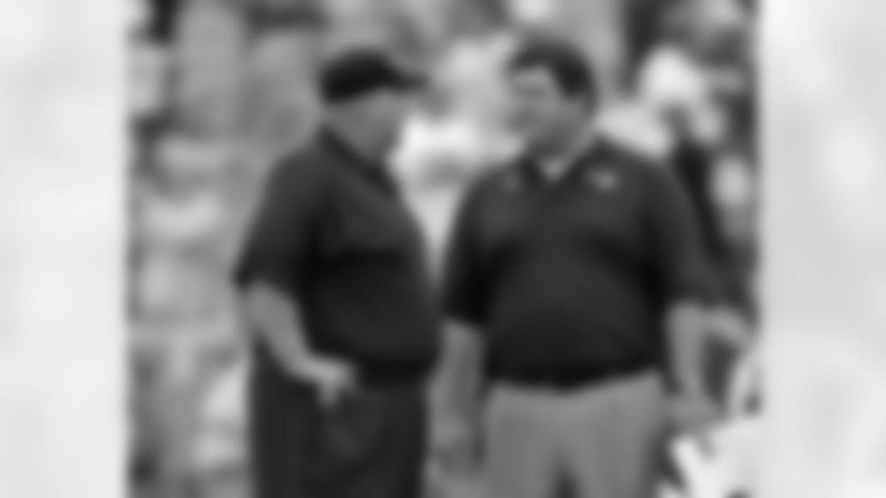 Head coach Andy Reid chats with FOX's Tony Siragusa