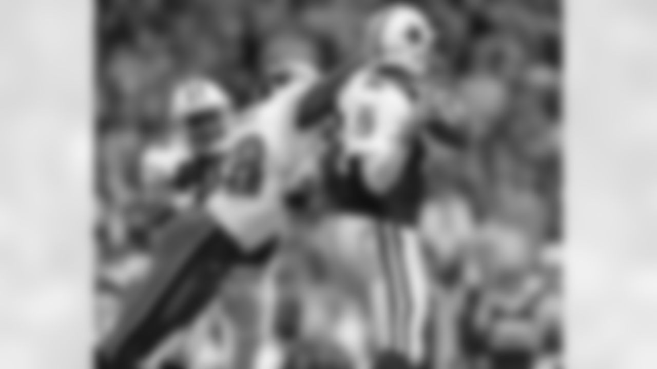 DE Trent Cole with pressure on QB Tony Romo