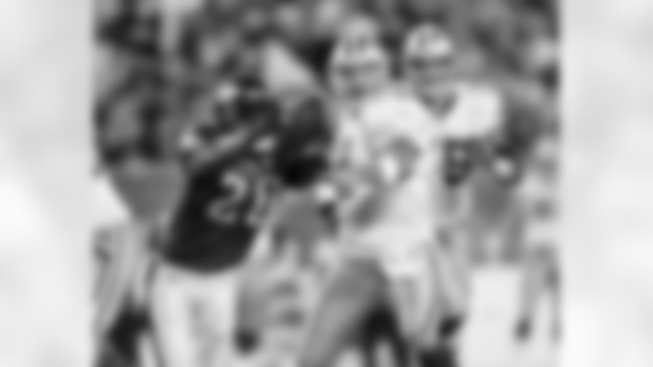 FS Brian Dawkins brings the heat on Dallas QB Tony Romo