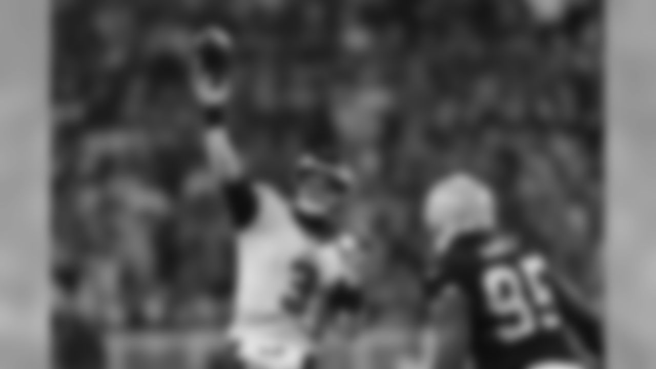 QB Mark Sanchez making a pass during the 2nd half