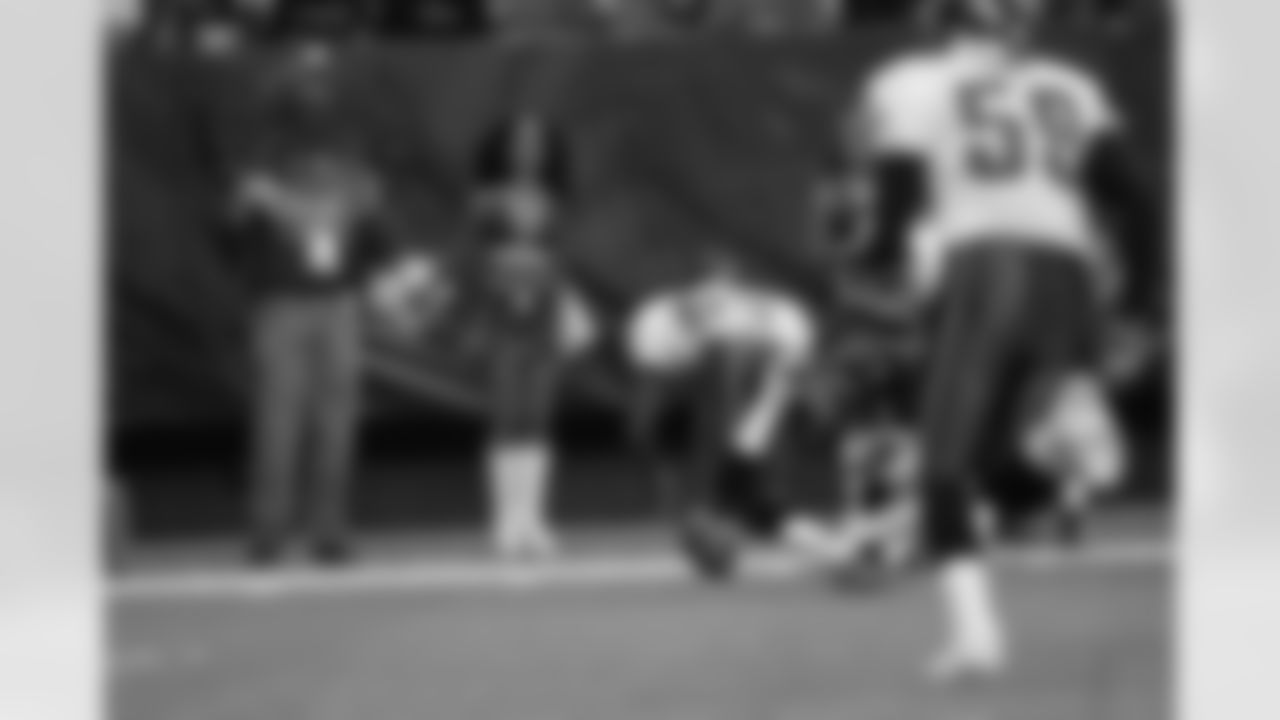 WR Greg Lewis jumps for a loose ball