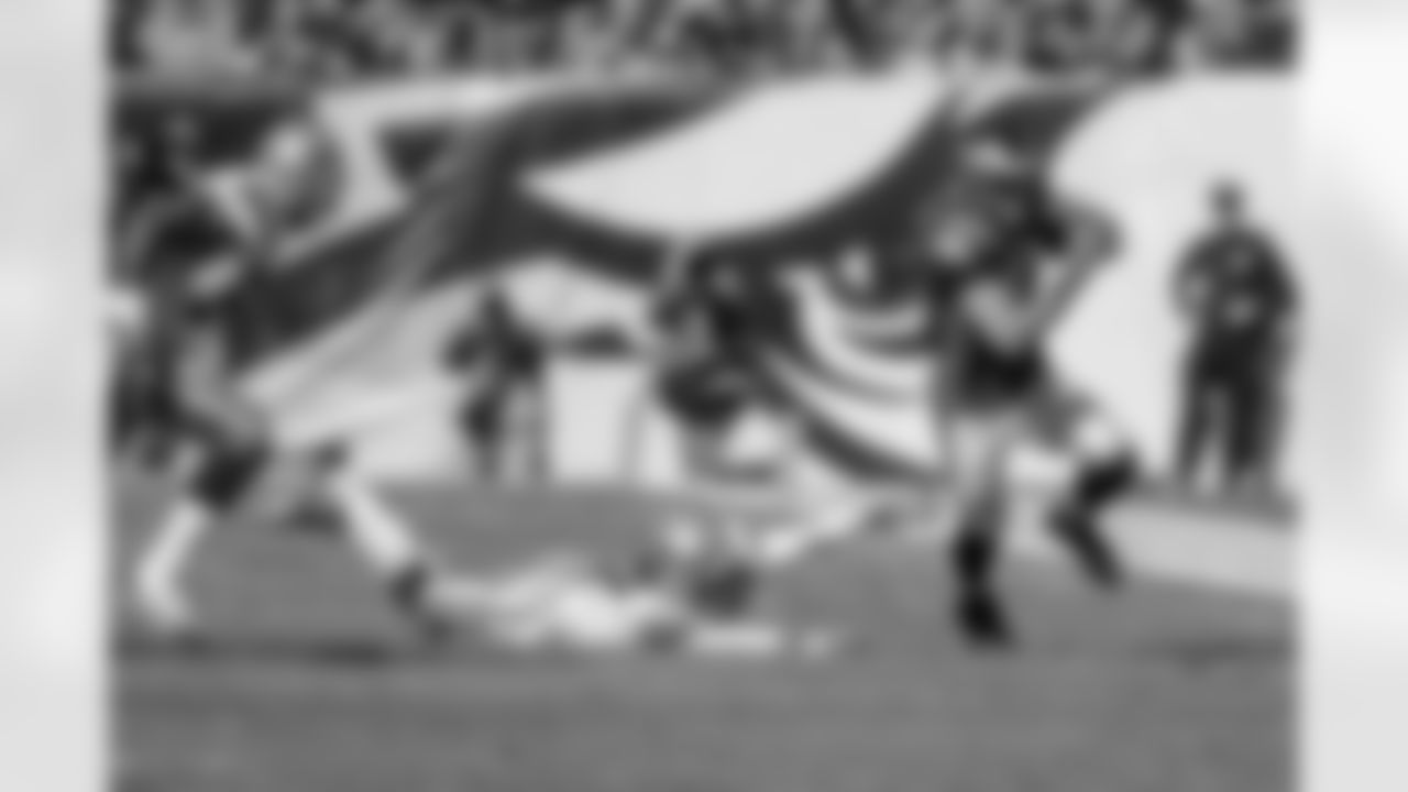 Eagles' WR Riley Cooper runs down the sidelines for a first down.
