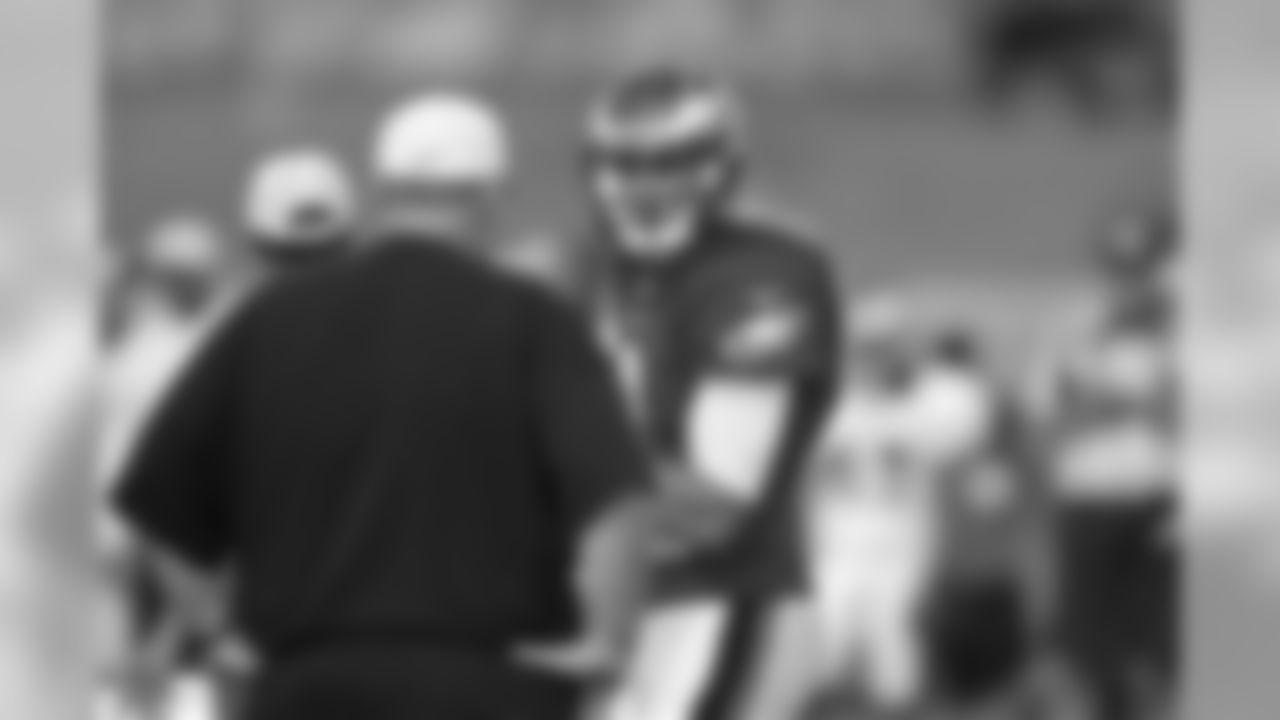 Head coach Andy Reid talks with QB Mike Kafka