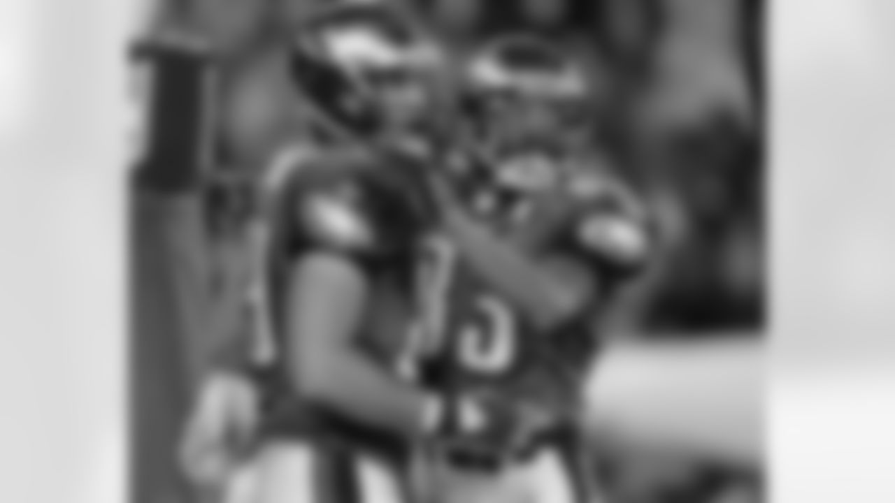WR Greg Lewis and TE Matt Schobel celebrate
