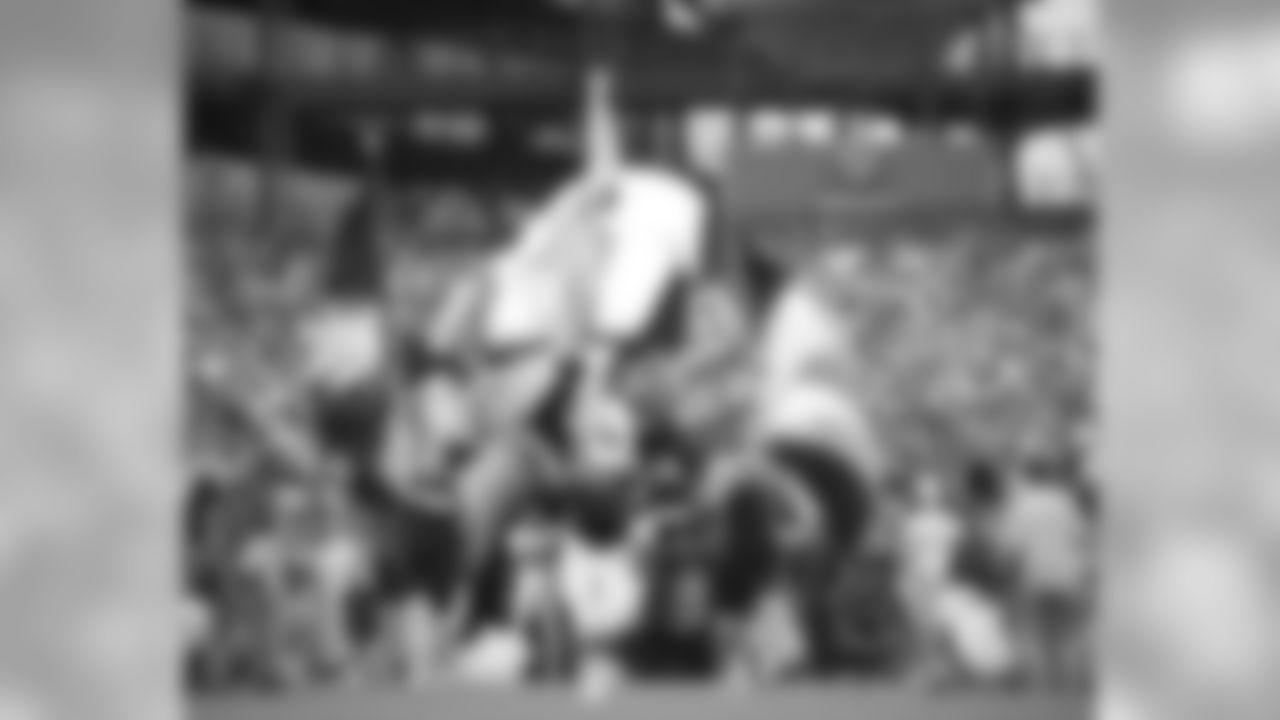 Swoop and crew run onto the field