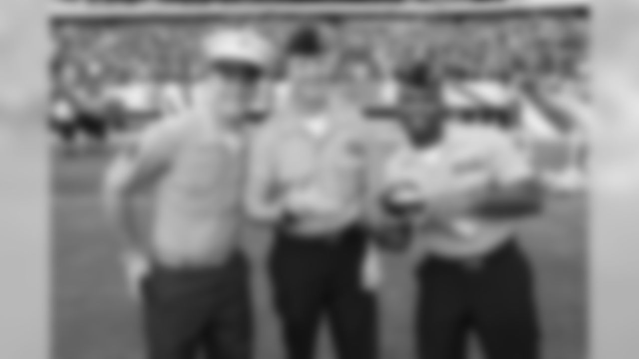 Soldiers pose for a photo on the field during public practice.