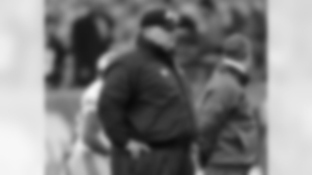 Head coach Andy Reid looks on pre-game