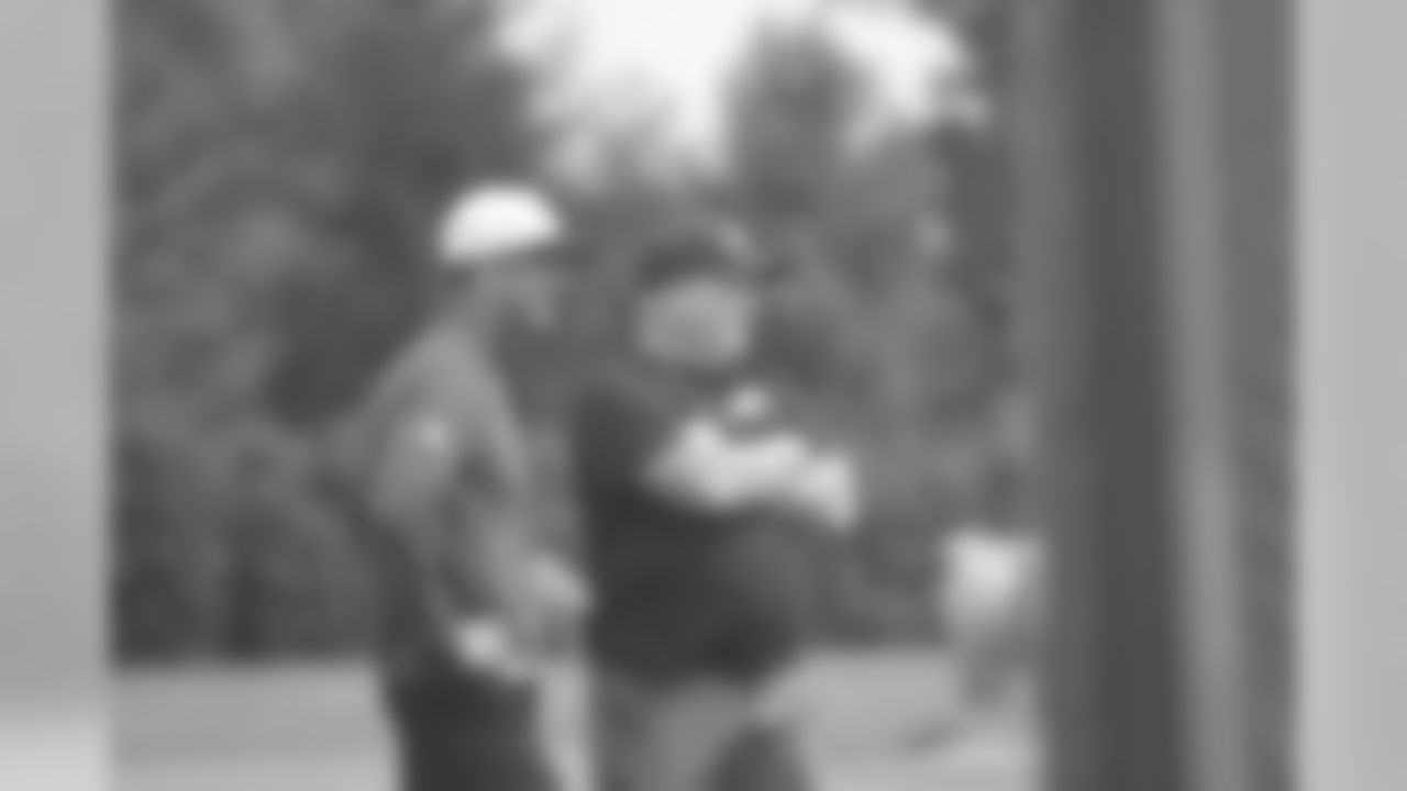 Ravens Head Coach John Harbaugh speaks with Eagles Head Coach Chip Kelly