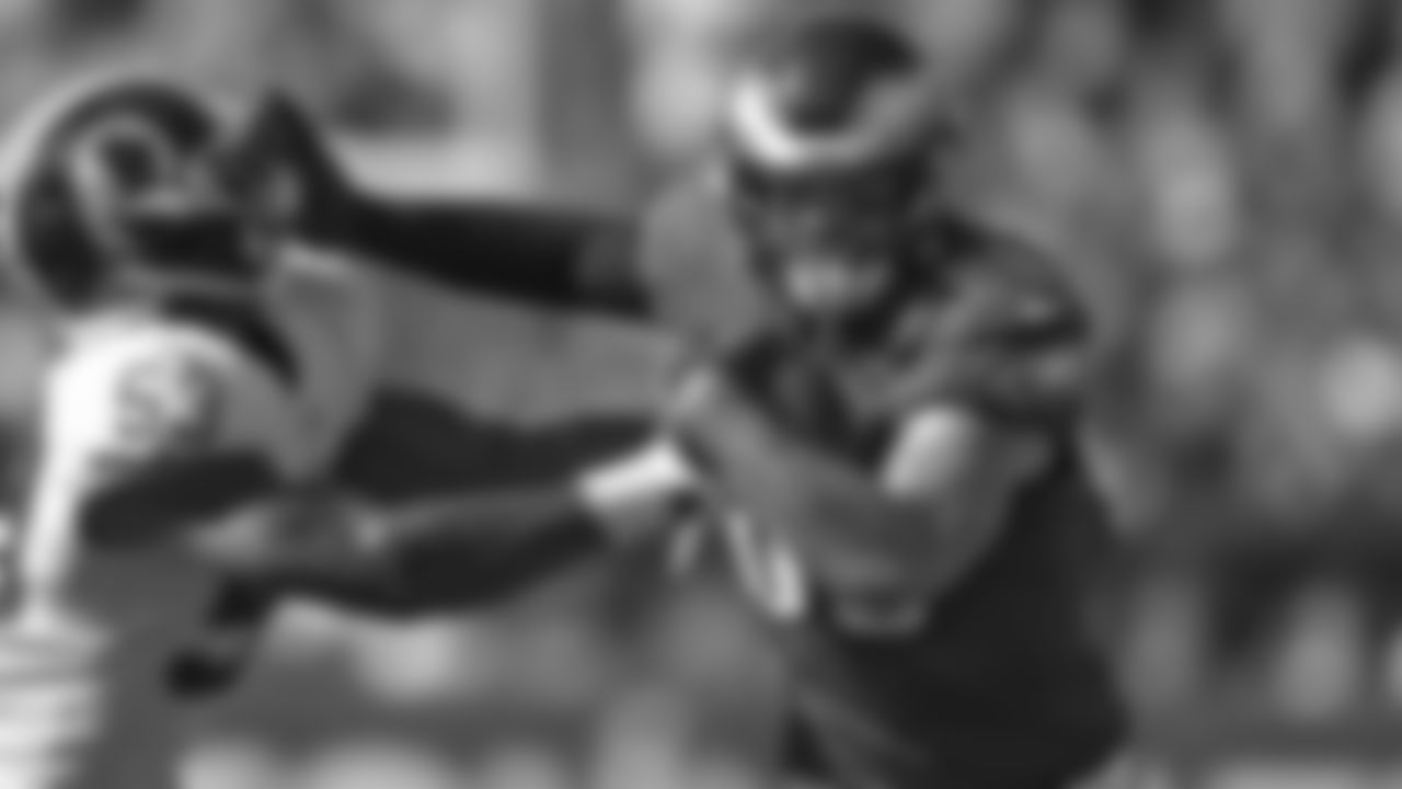 TE Dallas Goedert stiff arms a defender