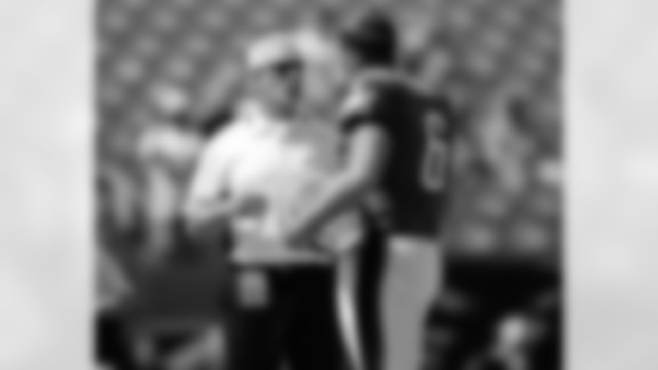 Coach Ted Daisher talks with P Sav Rocca