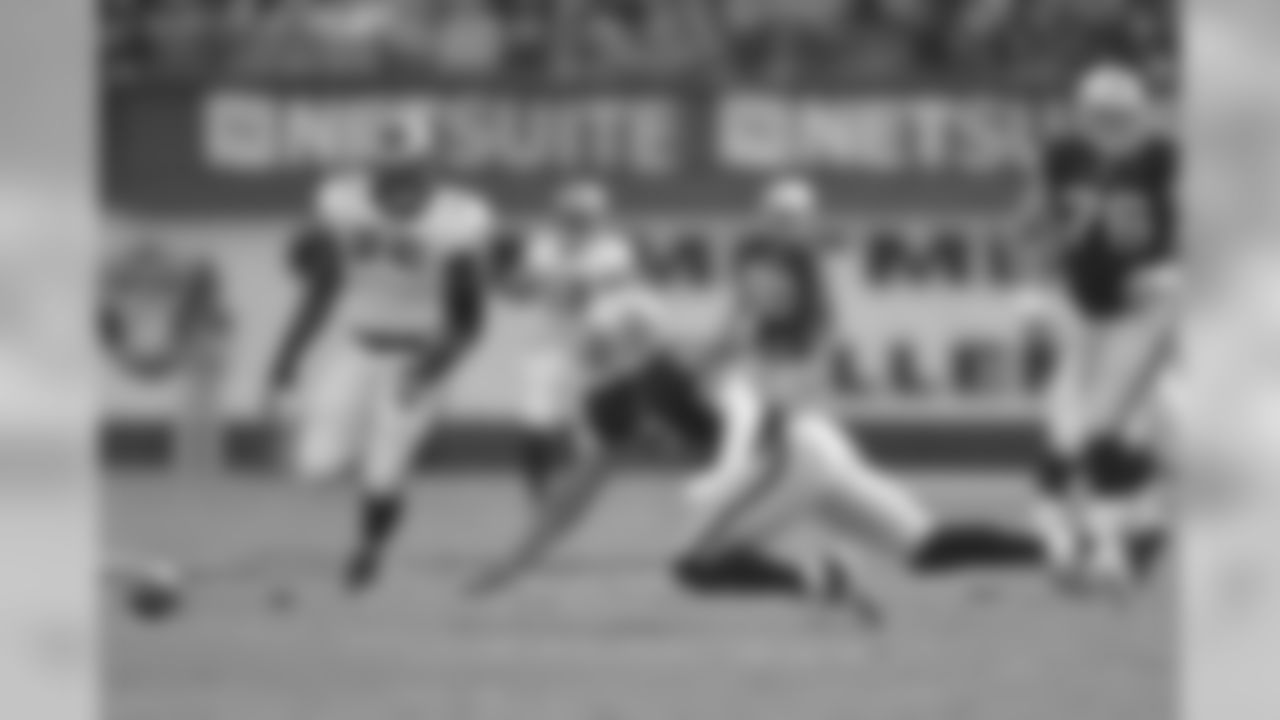 Raiders' QB Terrelle Pryor loses the football and tries to recover.