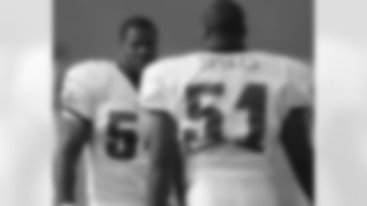 LBs Takeo Spikes and Jeremiah Trotter are all business on the field