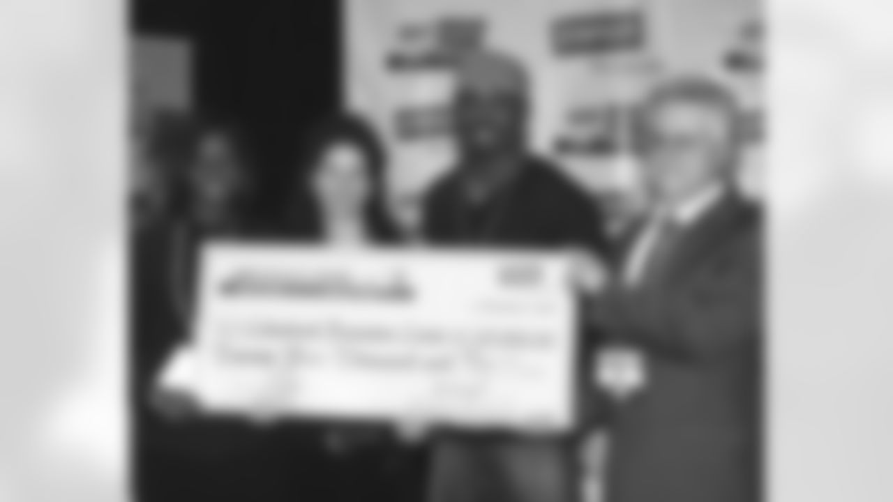 From left: Phila. Rec. Commissioner Susan Slawton, Christina Lurie, Brian Dawkins and Mike Nabb of Staples