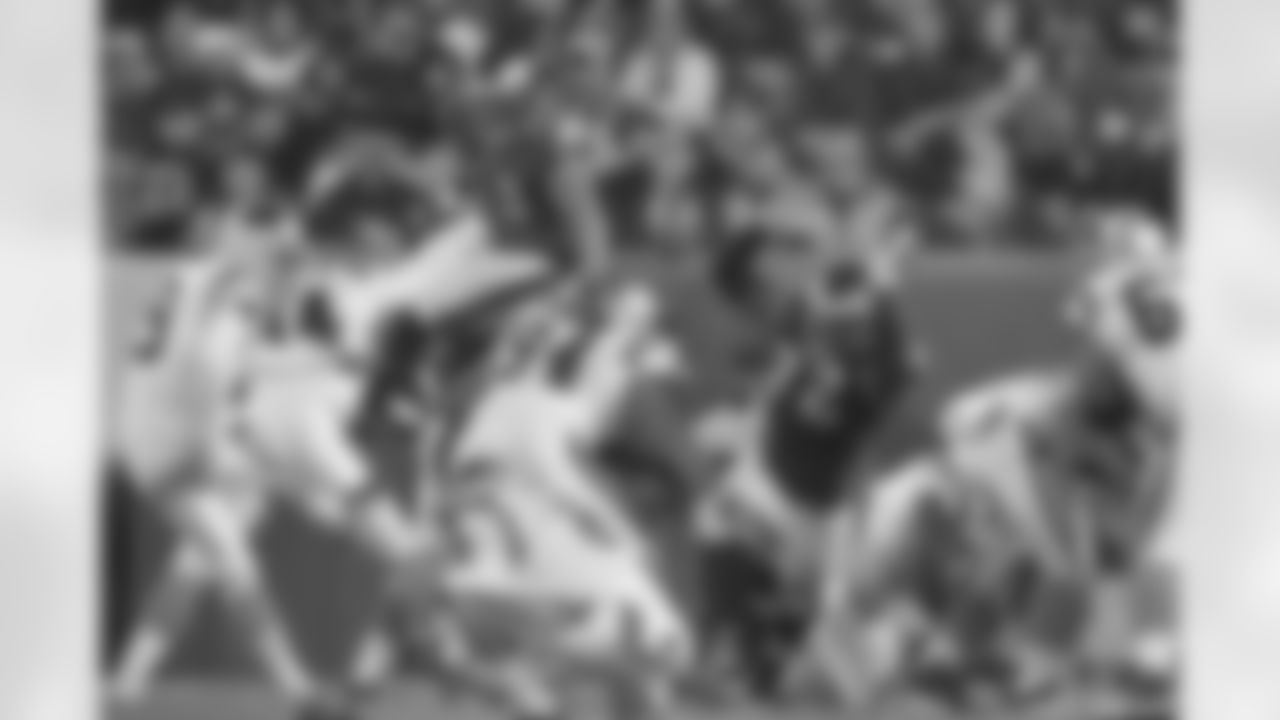 Eagles' players attempt to block a kick
