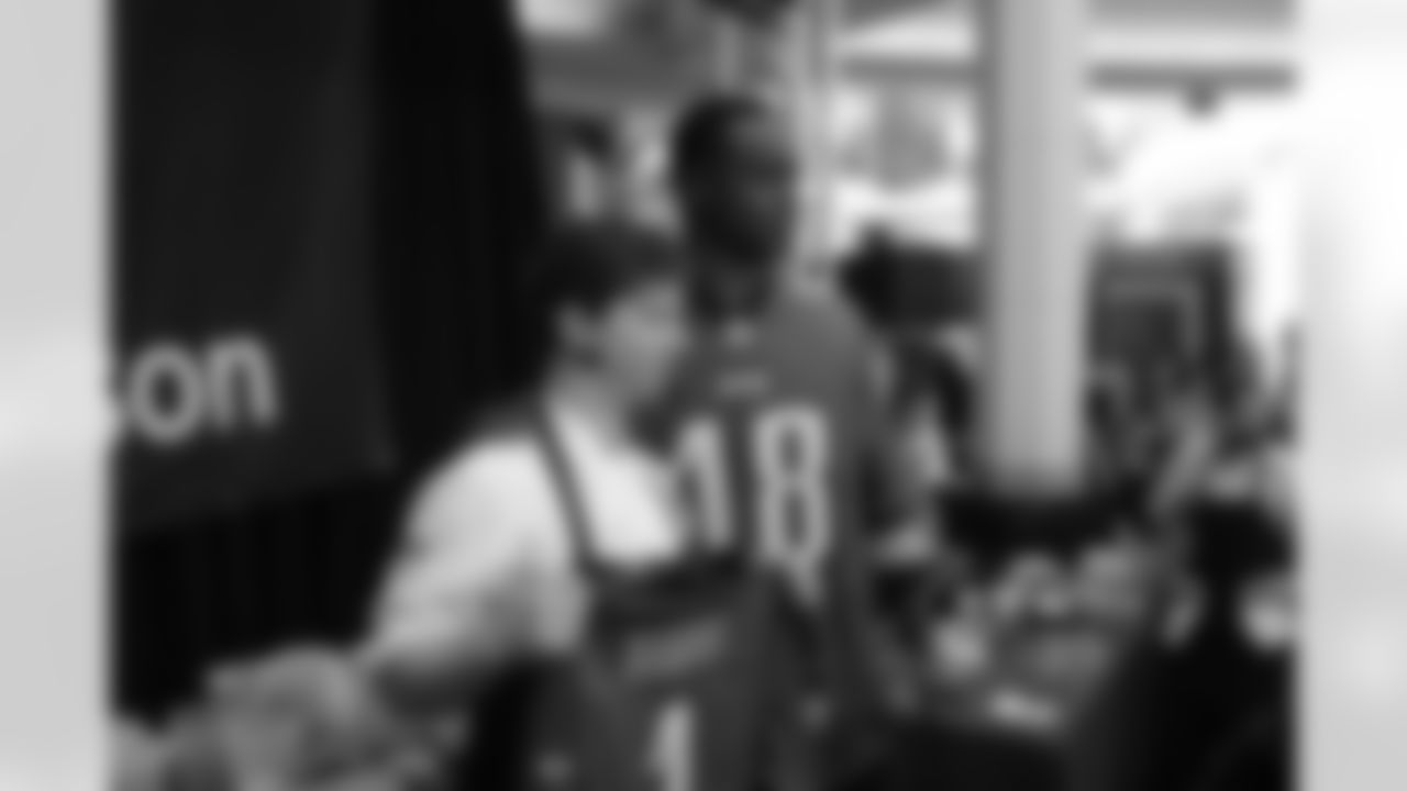 Chef Kyle Baddorf receives an Eagles jersey after doing an incredible job during the show