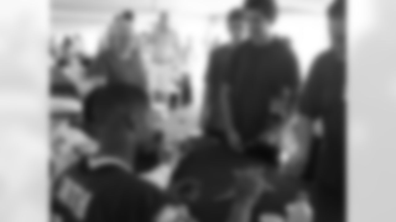 CB Cary Williams and WR Brad Smith greet fans after practice