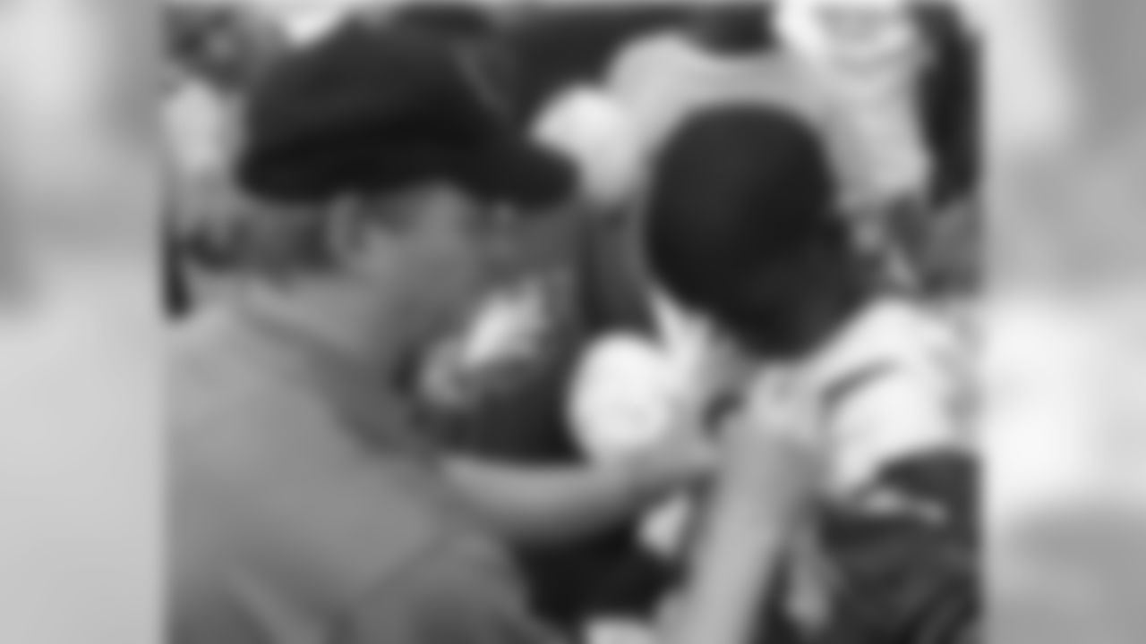 NFL Commissioner Roger Goodell met with some children following practice