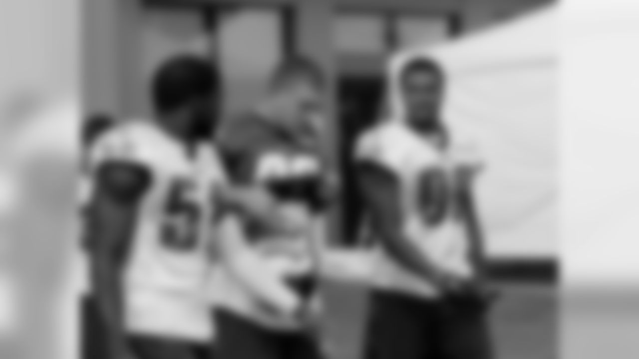LB Emmanuel Acho, TE Zach Ertz, and LB Marcus Smith II prior to the start of practice