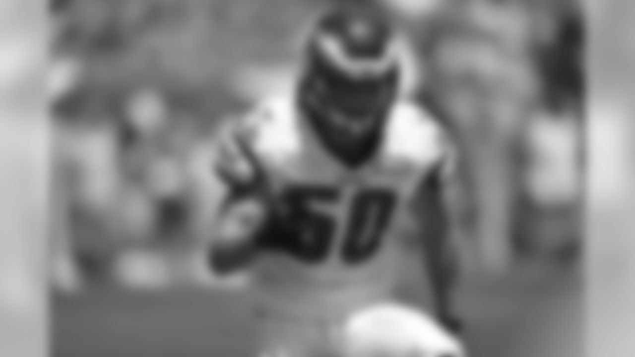 LB Kiko Alonso warms up before Open Practice