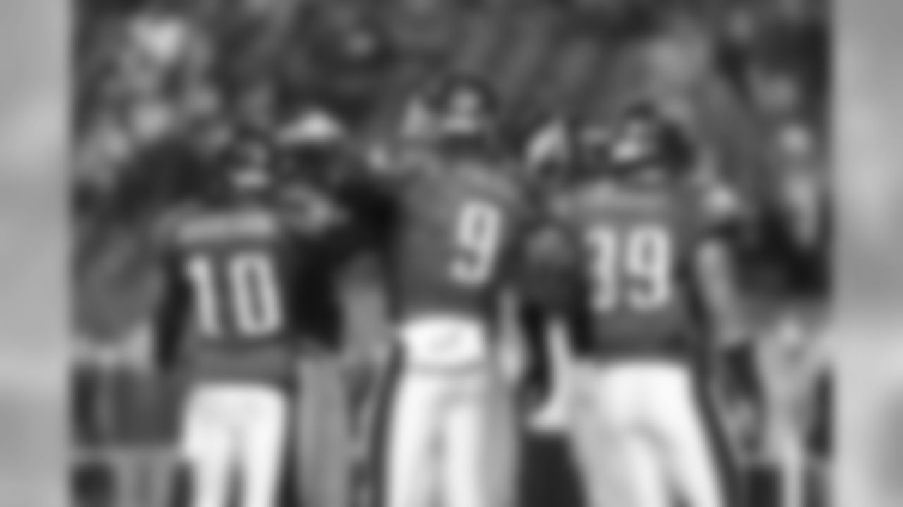 WR DeSean Jackson, QB Nick Foles, and FB Stanley Havili huddle up