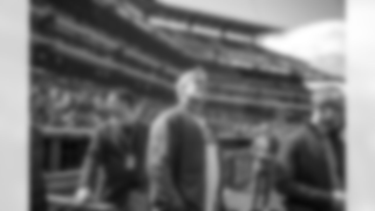 Coach Pederson steps onto the field.