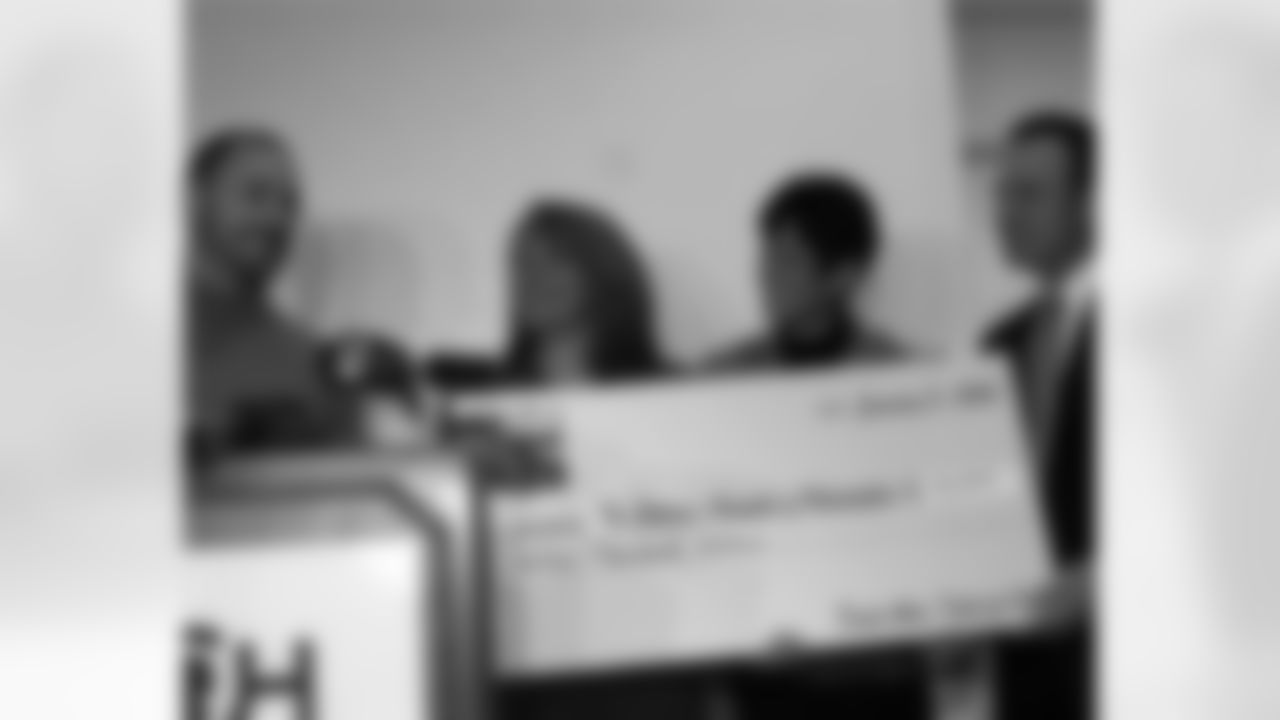K David Akers and Kicks for Kids also presented a check for $12,000 to the Little Rock Foundation Family Resource Room at CHOP