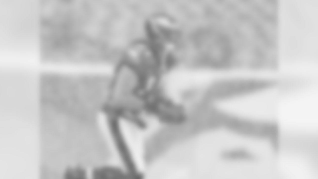 Eagles' WR Riley Cooper catches passes in the cold and snowy conditions before the week 14 game.
