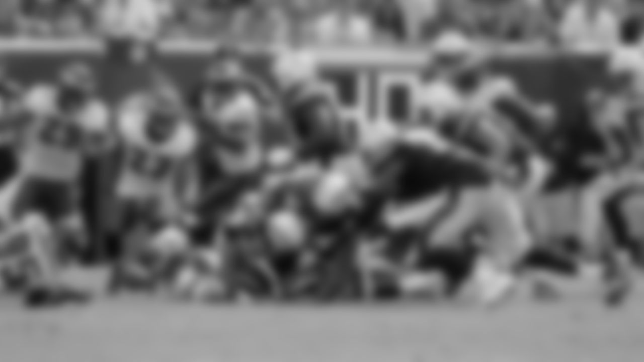 The Eagles' defense tries to recover the fumble by Chargers' runningback Ryan Mathews.
