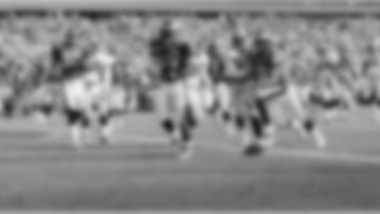 RB Brian Westbrook tosses the ball down after completing the TD.