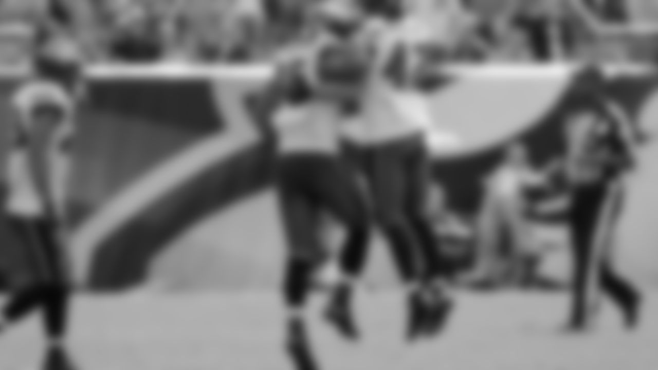 Eagles' linebacker Mychal Kendricks (95) and safety Kurt Coleman (42) celebrate after Kendricks recovered a fumble by Chargers' running back Ryan Mathews.