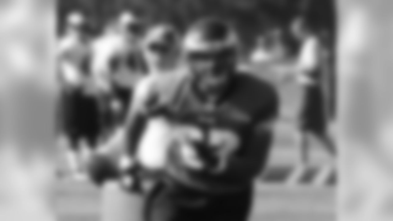TE Clay Harbor awaits the pass from position coach Tom Melvin