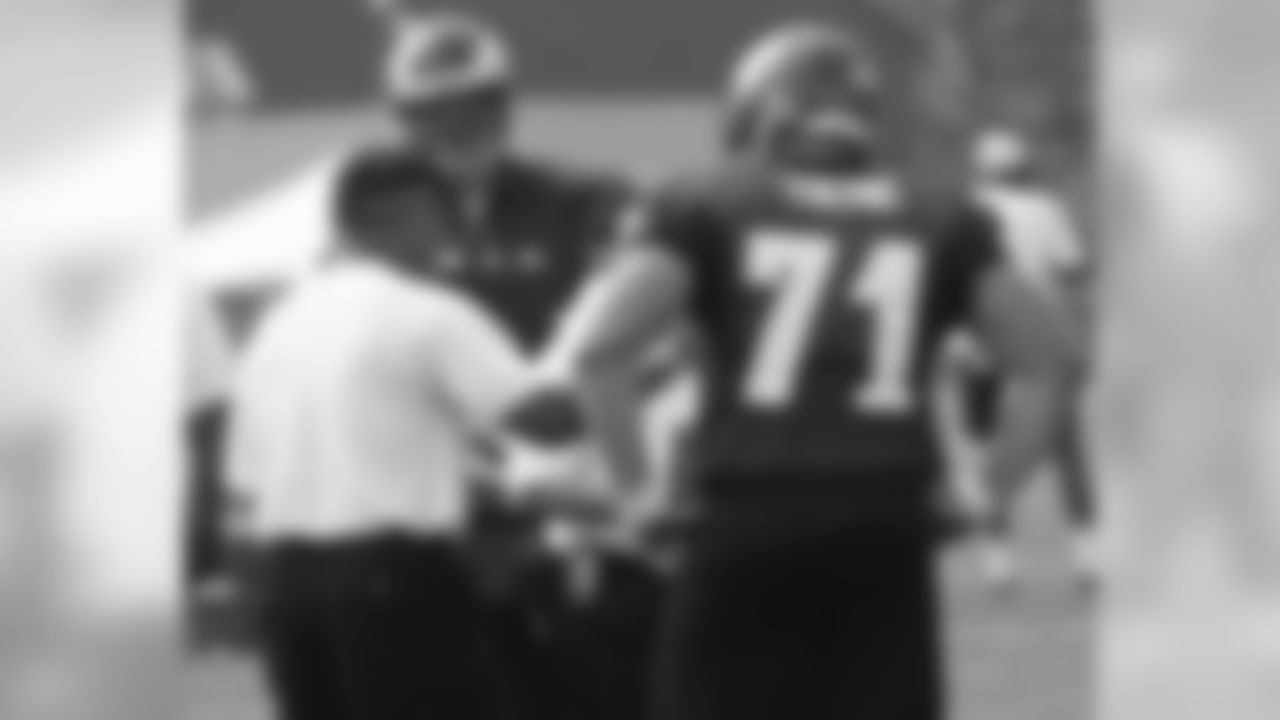 Juan Castillo works with the offensive line