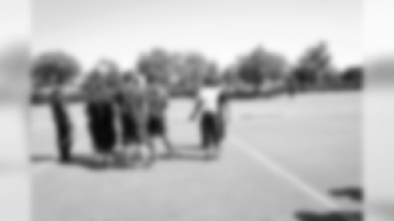 The students were eager to meet the team following practice.