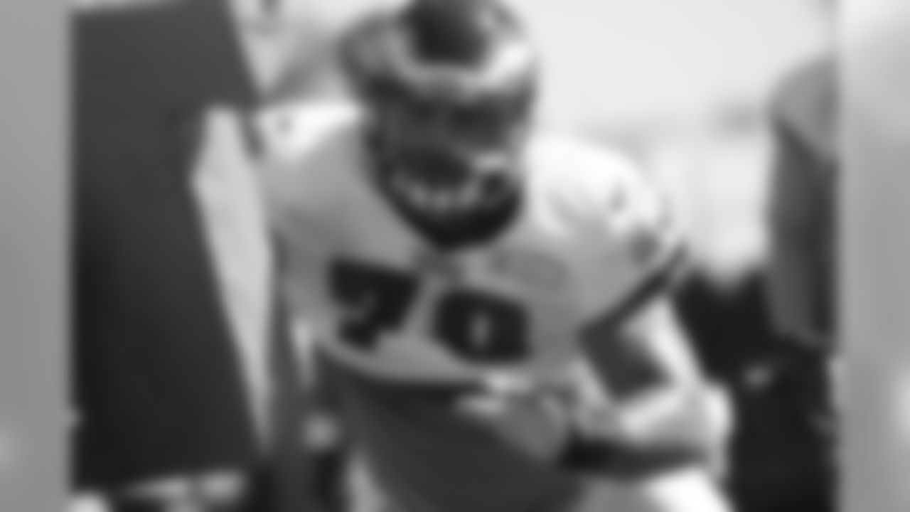 DE Travis Raciti goes at the sled
