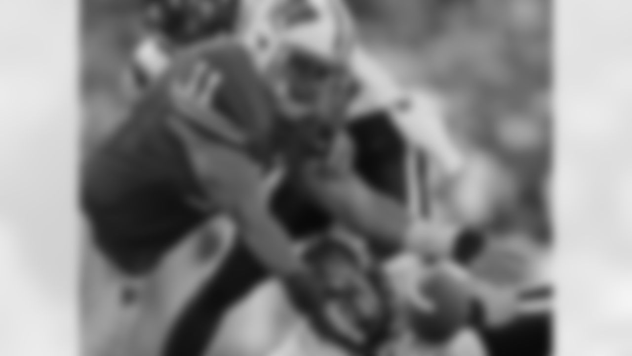 Detriot Lions LB DeAndre Levy played in the 2009 Shrine Game dawning the red and white helmet of the Wisconsin Badgers