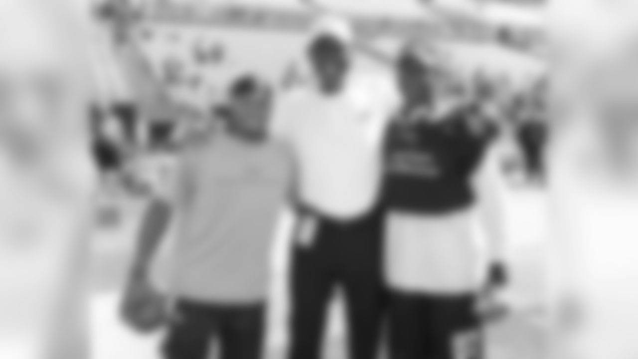 Harold Carmichael flanked by Carolina WRs Steve Smith and Muhsin Muhammad