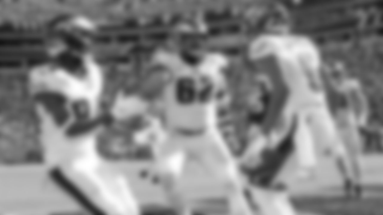 WR Greg Ward and C Jason Kelce celebrate with WR DeVonta Smith