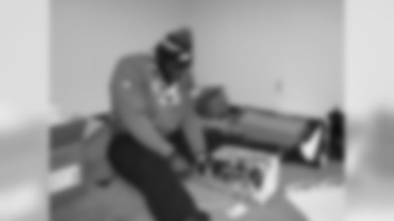 DT Bennie Logan working hard to wrap some gifts