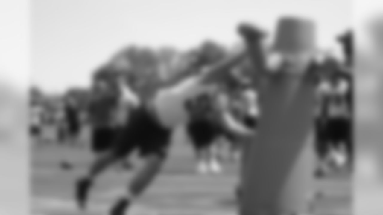 LB Bryan Braman practices stripping the ball