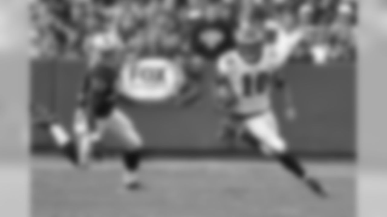 Eagles' WR DeSean Jackson catches a punt and returns it for yardage on special teams.