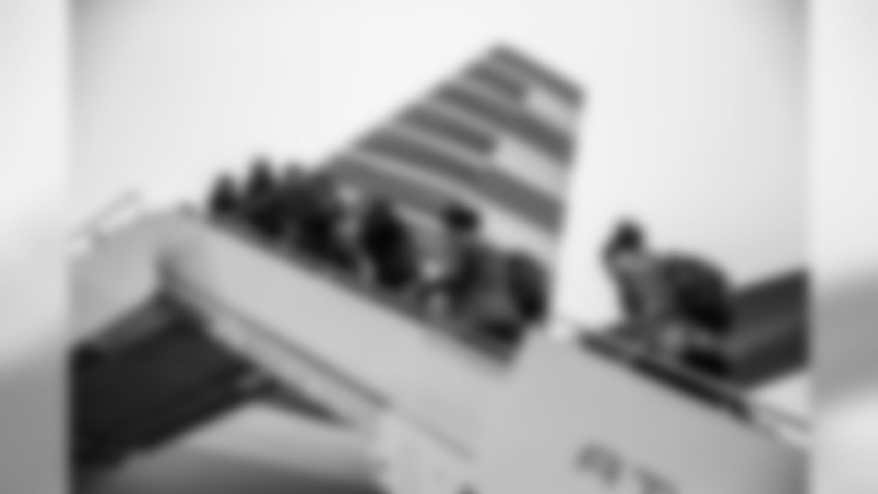 Eagles players board the plane to Minnesota