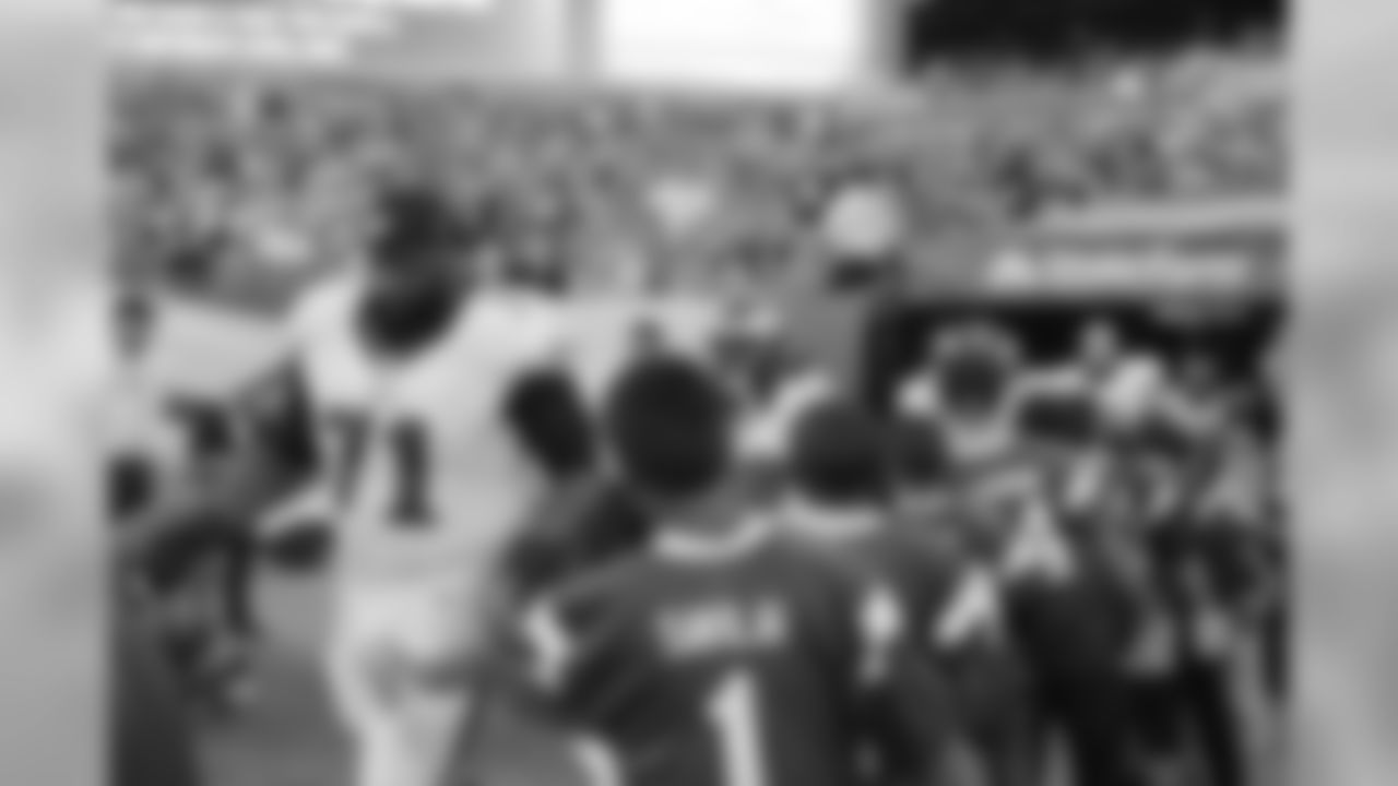The Olney Eagles greet the Philadelphia Eagles as they exit the tunnel