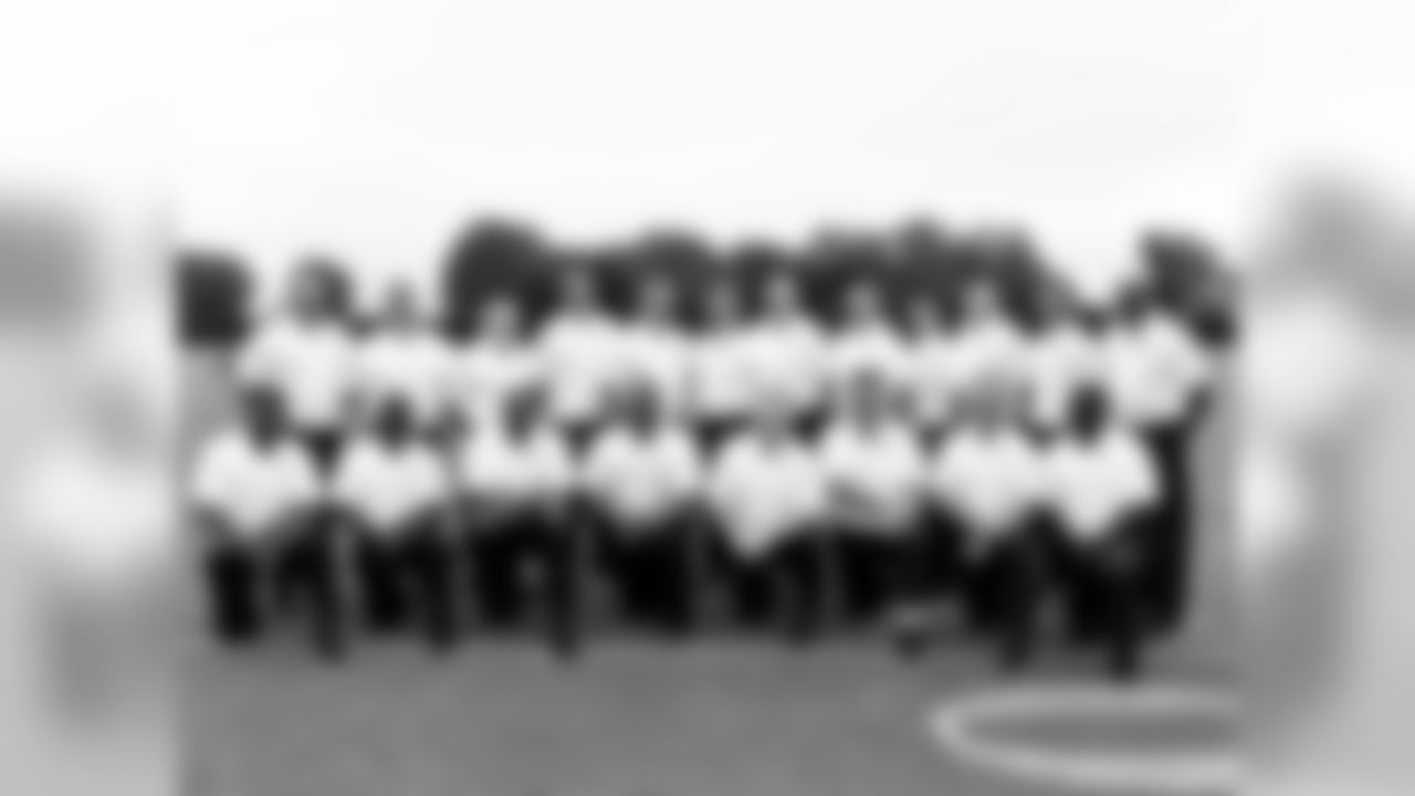 2014 Eagles Coaching Staff - back row (left to right): Mike Dawson, Jeff Stoutland, Jerry Azzinaro, Justin Peelle, Pat Shurmur, John Lovett, Bill Musgrave, Rick Minter, Shea Tierney, Bill McGovern, Press Taylor, Ted Williams - front row (left to right): Michael Clay, Quadrian Banks, Greg Austin, Duce Staley, Chip Kelly, Bob Bicknell, Billy Davis, R.J. Harvey