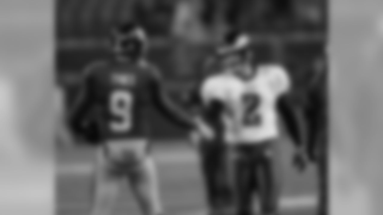 Pre-game handshake ... Giants K Lawrence Tynes and Eagles K David Akers