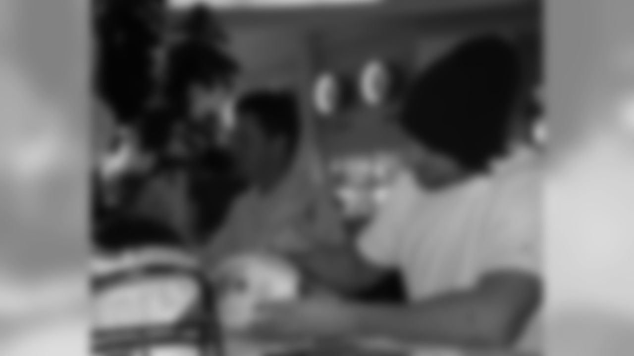 Kevin Curtis and Kevin Kolb signed autographs to help raise money for Tackling Breast Cancer