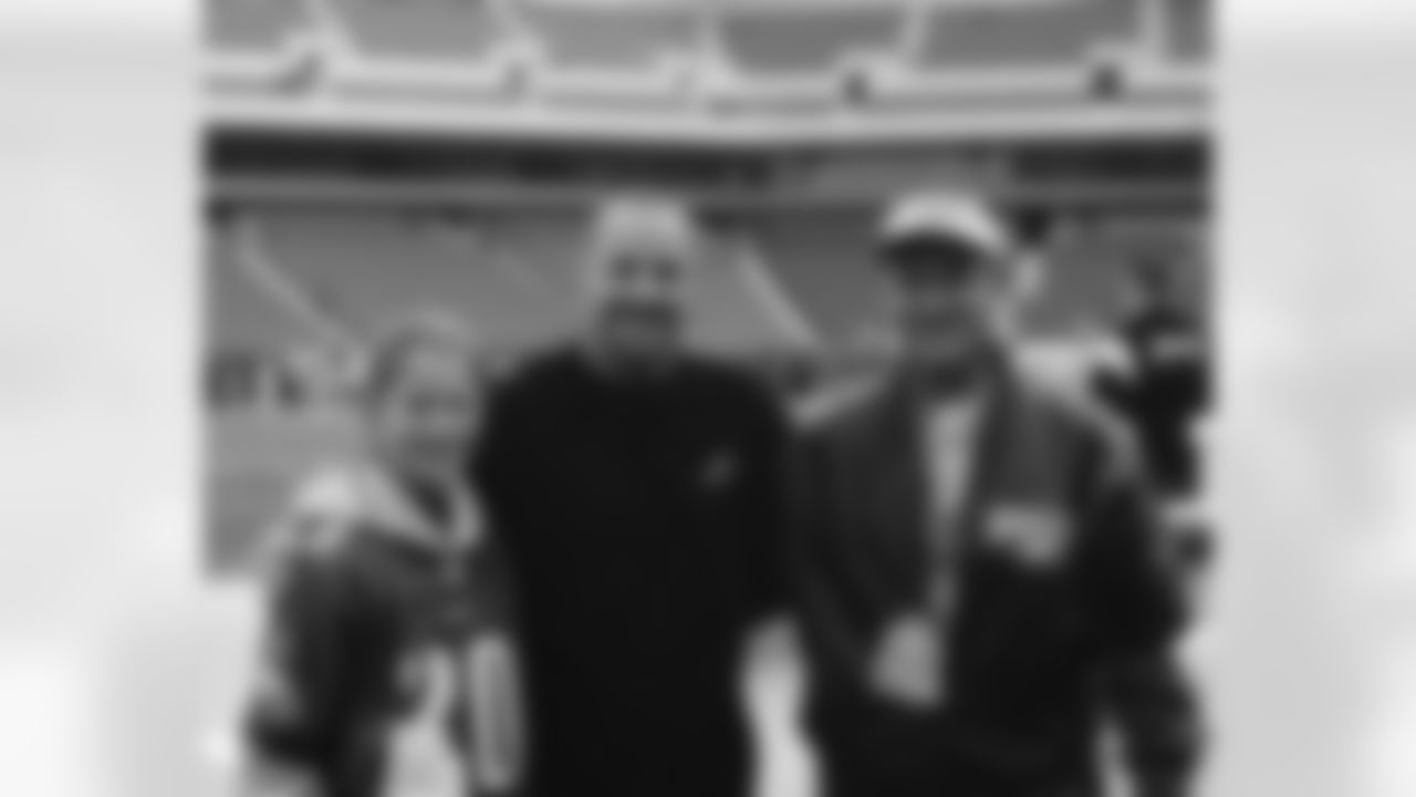 David Akers and contest winners Joseph Boudwin and Madeline McTigue