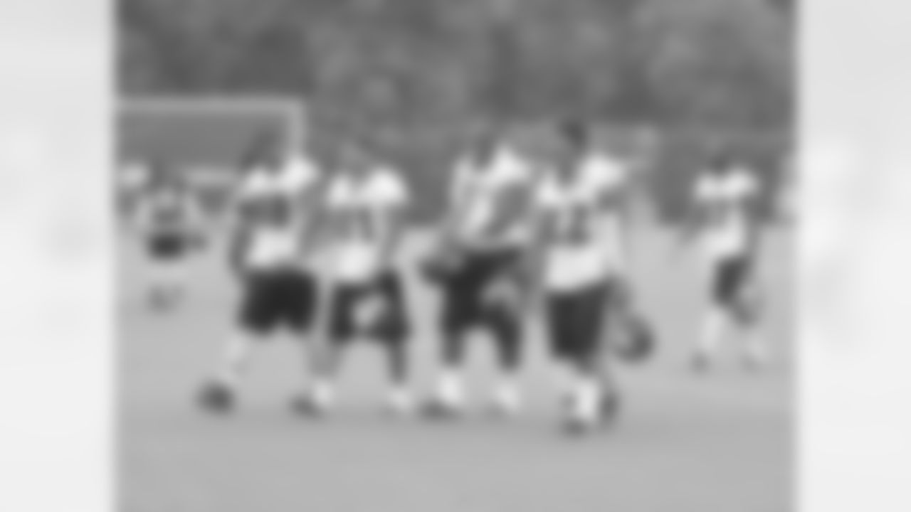 All smiles as the rain comes down